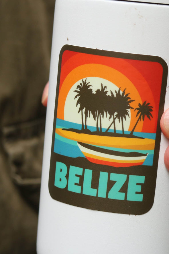 close up of belize vinyl travel sticker on white water bottle